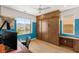 Stylish bedroom with a Murphy bed, ample storage, and mountain views at 2578 Skylark Trail St, Henderson, NV 89044