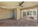 Spacious covered patio features brick flooring, ceiling fan and seamless indoor-outdoor living at 2578 Skylark Trail St, Henderson, NV 89044
