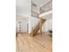 Bright entryway with a modern staircase and wood flooring at 2578 Skylark Trail St, Henderson, NV 89044