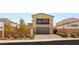 Charming home features a landscaped front yard and a spacious driveway with ample parking at 2578 Skylark Trail St, Henderson, NV 89044