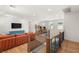 Bright loft area with wood floors, comfortable seating and a large screen television at 2578 Skylark Trail St, Henderson, NV 89044