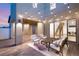 Outdoor patio area with lounge furniture and string lights at 2578 Skylark Trail St, Henderson, NV 89044