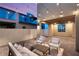 Inviting backyard patio with comfortable seating and outdoor lighting at 2578 Skylark Trail St, Henderson, NV 89044