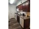 Functional kitchen featuring laminate countertops and standard appliances at 2606 S Durango Dr # 214, Las Vegas, NV 89117
