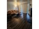 Comfortable living room with access to a balcony, and featuring a cozy fireplace at 2606 S Durango Dr # 214, Las Vegas, NV 89117