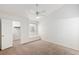 Bedroom features a ceiling fan, carpet, a window seat, and closet access at 2725 S Nellis Blvd # 2049, Las Vegas, NV 89121