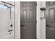 Shower and shelving near gray doors at 305 Napa Hills Dr, Las Vegas, NV 89144