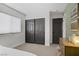 Bedroom features closet with sliding doors and a window at 305 Napa Hills Dr, Las Vegas, NV 89144