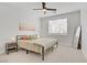 Bright bedroom featuring a ceiling fan, neutral color palette, and a minimalist aesthetic at 305 Napa Hills Dr, Las Vegas, NV 89144