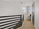 Hallway leading to an office with a modern desk and a black door at 305 Napa Hills Dr, Las Vegas, NV 89144