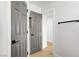 Hallway between doors with wood-style floors at 305 Napa Hills Dr, Las Vegas, NV 89144