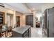 Bright, open kitchen with an island and lots of cabinet space, adjoined with a dining area at 310 Pissarro Pl, Henderson, NV 89074