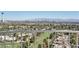 A wide balcony view overlooking a golf course and the Las Vegas cityscape skyline at 3111 Bel Air Dr # 22B, Las Vegas, NV 89109