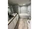Modern bathroom featuring sleek tiling, contemporary fixtures, and a luxurious soaking tub at 3111 Bel Air Dr # 22B, Las Vegas, NV 89109