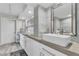 Bathroom vanity with double sinks, mirrors, and stylish decor at 3111 Bel Air Dr # 22B, Las Vegas, NV 89109
