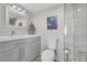 Contemporary bathroom with sleek vanity, modern fixtures, and glass-enclosed shower at 3111 Bel Air Dr # 22B, Las Vegas, NV 89109