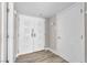Elegant entryway with paneled double doors and wood-look tile flooring at 3111 Bel Air Dr # 22B, Las Vegas, NV 89109