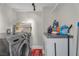 Efficient laundry room featuring modern appliances and storage space at 3111 Bel Air Dr # 22B, Las Vegas, NV 89109