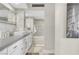 Stylish main bathroom with double vanity, modern fixtures and a bathtub shower combo at 3111 Bel Air Dr # 22B, Las Vegas, NV 89109