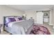 Main bedroom showcasing a king-size bed and sliding door to the bathroom at 3111 Bel Air Dr # 22B, Las Vegas, NV 89109