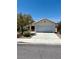 Charming single-story home featuring a well-maintained front yard, desert landscaping, and an attached two-car garage at 3665 Lucky Horseshoe Ct, Las Vegas, NV 89129