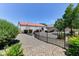 This home's backyard features low-maintenance desert landscaping and wrought iron fencing at 3823 Aspen Creek Ave, North Las Vegas, NV 89031