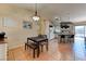 Cozy dining area with natural light and open concept to the kitchen at 3823 Aspen Creek Ave, North Las Vegas, NV 89031