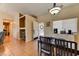 Bright dining area with open entry and tile flooring at 3823 Aspen Creek Ave, North Las Vegas, NV 89031