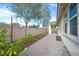 An inviting back patio with desert landscaping for outdoor enjoyment at 4020 Recktenwall Ave, North Las Vegas, NV 89081