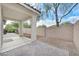 Backyard with covered patio and block wall fence at 4020 Recktenwall Ave, North Las Vegas, NV 89081