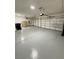 Clean, spacious garage with epoxy flooring and two automatic doors at 4020 Recktenwall Ave, North Las Vegas, NV 89081