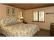 Comfortable bedroom with floral bedding and natural light at 4178 Matterhorn Way, Las Vegas, NV 89124