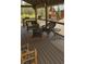 Cozy covered deck with comfortable wicker furniture, ideal for relaxing outdoors at 4178 Matterhorn Way, Las Vegas, NV 89124