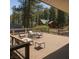 Inviting deck with outdoor seating, perfect for relaxing and enjoying the natural scenery at 4178 Matterhorn Way, Las Vegas, NV 89124
