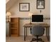 Home office with desk, computer, cabinet, bookshelf and pictures on the wall at 4178 Matterhorn Way, Las Vegas, NV 89124