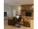 Cozy living room with stone fireplace and neutral furnishings at 4178 Matterhorn Way, Las Vegas, NV 89124