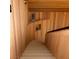 Beautiful staircase with wood paneling and neutral carpet at 4178 Matterhorn Way, Las Vegas, NV 89124