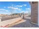 Exterior shot of front gate leading to a walkway with view of the neighborhood at 421 Point Sur Ave, Las Vegas, NV 89138