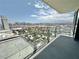 Wonderful condo balcony view features lush treetops and city skyline, perfect for outdoor relaxation at 4381 W Flamingo Rd # 2022, Las Vegas, NV 89103