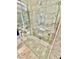 Modern bathroom featuring a glass-enclosed shower with marble tile surround at 4381 W Flamingo Rd # 2022, Las Vegas, NV 89103