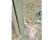 Modern bathroom with marble tile, a toilet, and a glass-enclosed shower at 4381 W Flamingo Rd # 2022, Las Vegas, NV 89103