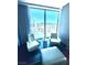 Living area featuring floor-to-ceiling windows offering stunning views of the city skyline at 4381 W Flamingo Rd # 2022, Las Vegas, NV 89103