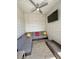 Enjoy a relaxing outdoor seating area with comfortable furniture and a ceiling fan at 4381 W Flamingo Rd # 2022, Las Vegas, NV 89103