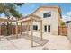 Backyard with a pergola, patio, privacy fence, and access to the house at 4552 Aviation St, Las Vegas, NV 89115