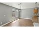 Bright dining area features wood-look floors, window, and decorative chandelier at 4552 Aviation St, Las Vegas, NV 89115