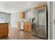 Bright kitchen with stainless steel appliances and wood cabinets at 4552 Aviation St, Las Vegas, NV 89115