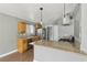 Spacious kitchen with granite countertops, stainless appliances, and bright lighting at 4552 Aviation St, Las Vegas, NV 89115