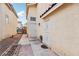 A home side entrance is complemented by desert landscaping and a secure gate at 4552 Aviation St, Las Vegas, NV 89115