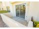 Cozy outdoor balcony with sliding glass doors offering natural light and neighborhood views at 4810 Grey Wolf Ln # 104, Las Vegas, NV 89149