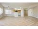 Bright living room features wood-look floors, recessed lighting and a modern, open design at 4810 Grey Wolf Ln # 104, Las Vegas, NV 89149